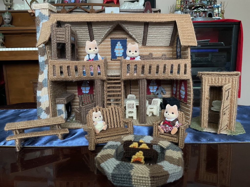 My Log Cabin that I made from a Mary Maxim plastic canvas needle work kit.