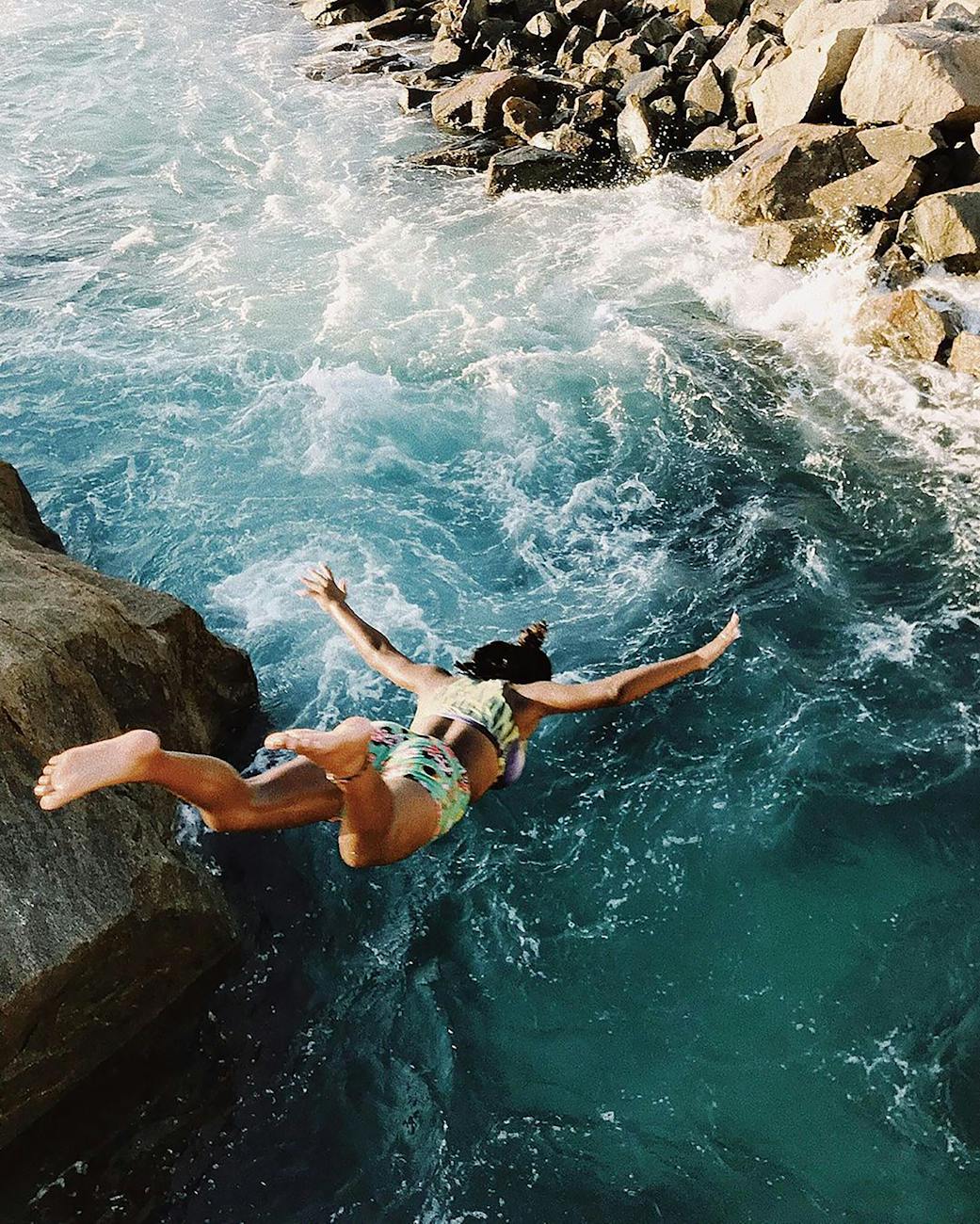 woman jumped from the cliff. Leaping outside your comfort zone isn't always easy, but has incredible ramifications. Here is how my life has changed by taking that leap!